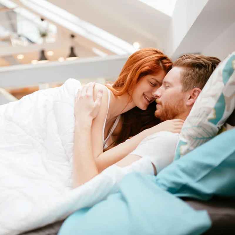 heterosexual couple experiencing the effects of behavior modification in bed