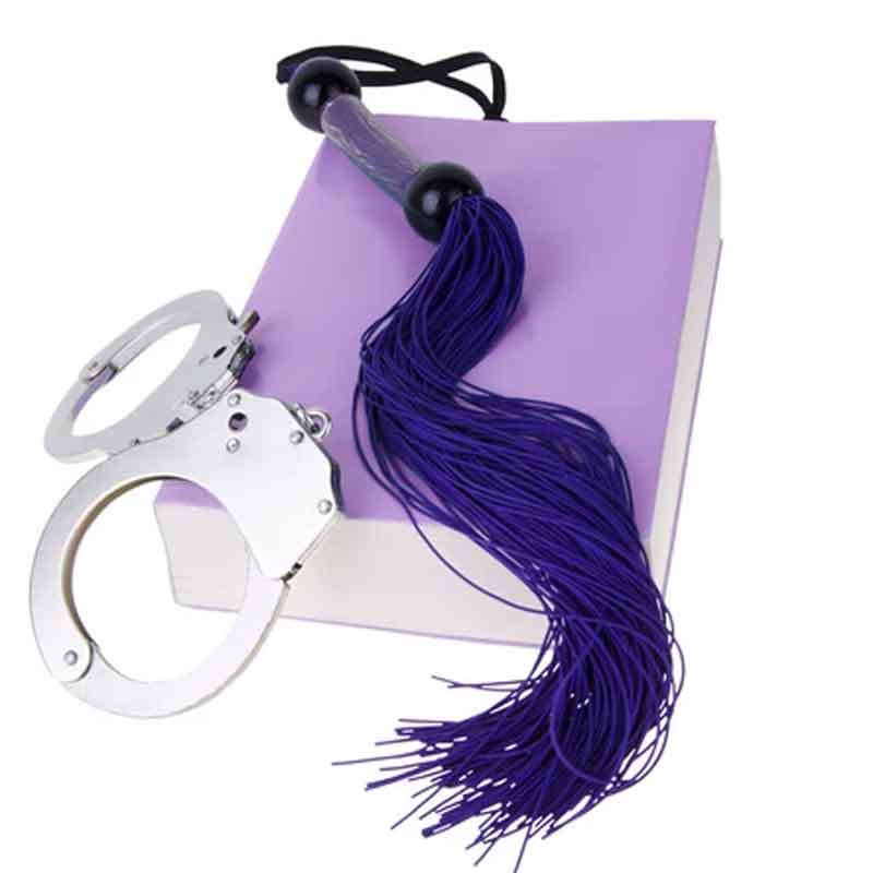 a book introducing your partner to chastity with a flogger and handcuffs