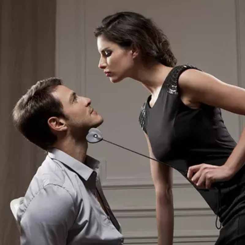 mistress and her husband being teased with a  riding crop